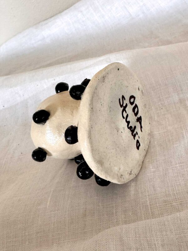 Knottrig ljusstake creme