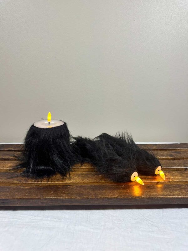 Kronljus svart långhårig päls